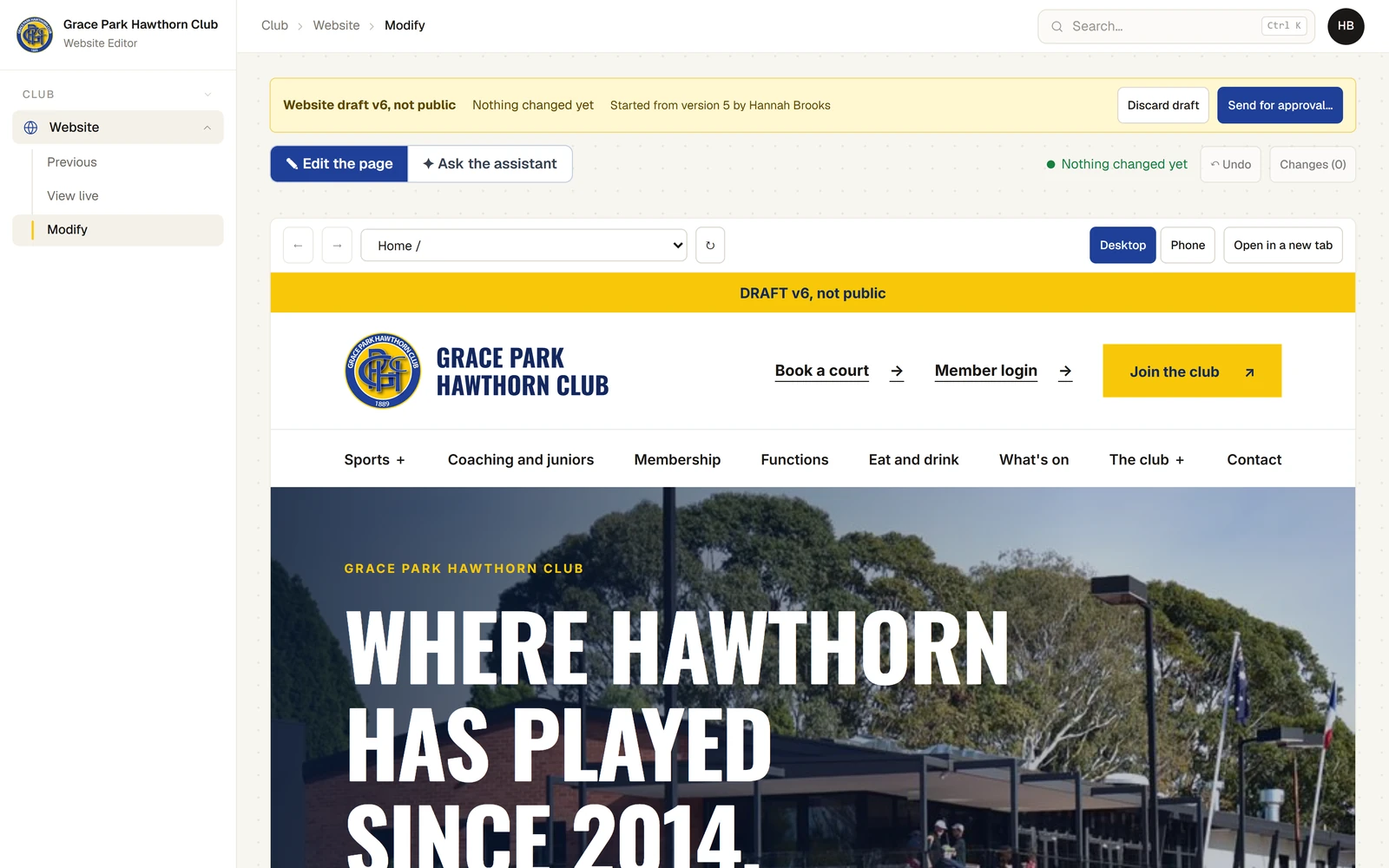 The Website page with a draft open. A yellow bar says "Website draft v6, not public", "Nothing changed yet" and "Started from version 5 by Hannah Brooks", with Discard draft and Send for approval. Below it Edit the page is chosen beside Ask the assistant, then Undo and Changes, and the club website’s home page fills the rest, under a band that says "DRAFT v6, not public".
